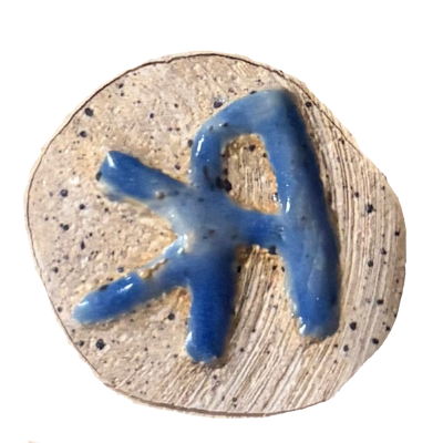 Pedram Kazemian's maker's mark, pressed and glazed in clay